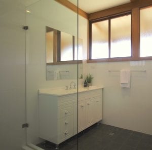Bathroom sink and glass shower